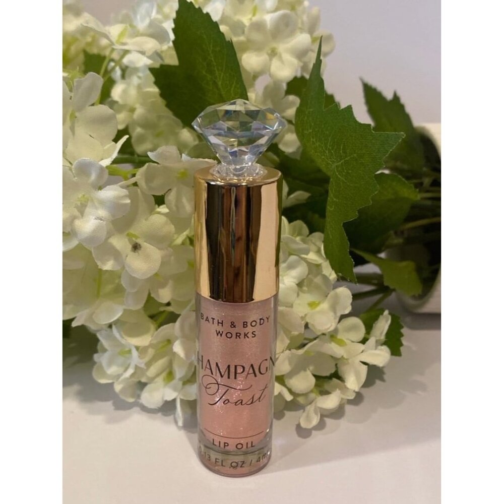 Bath & Body Works “Champagne Toast” New & Sealed Lip Oil